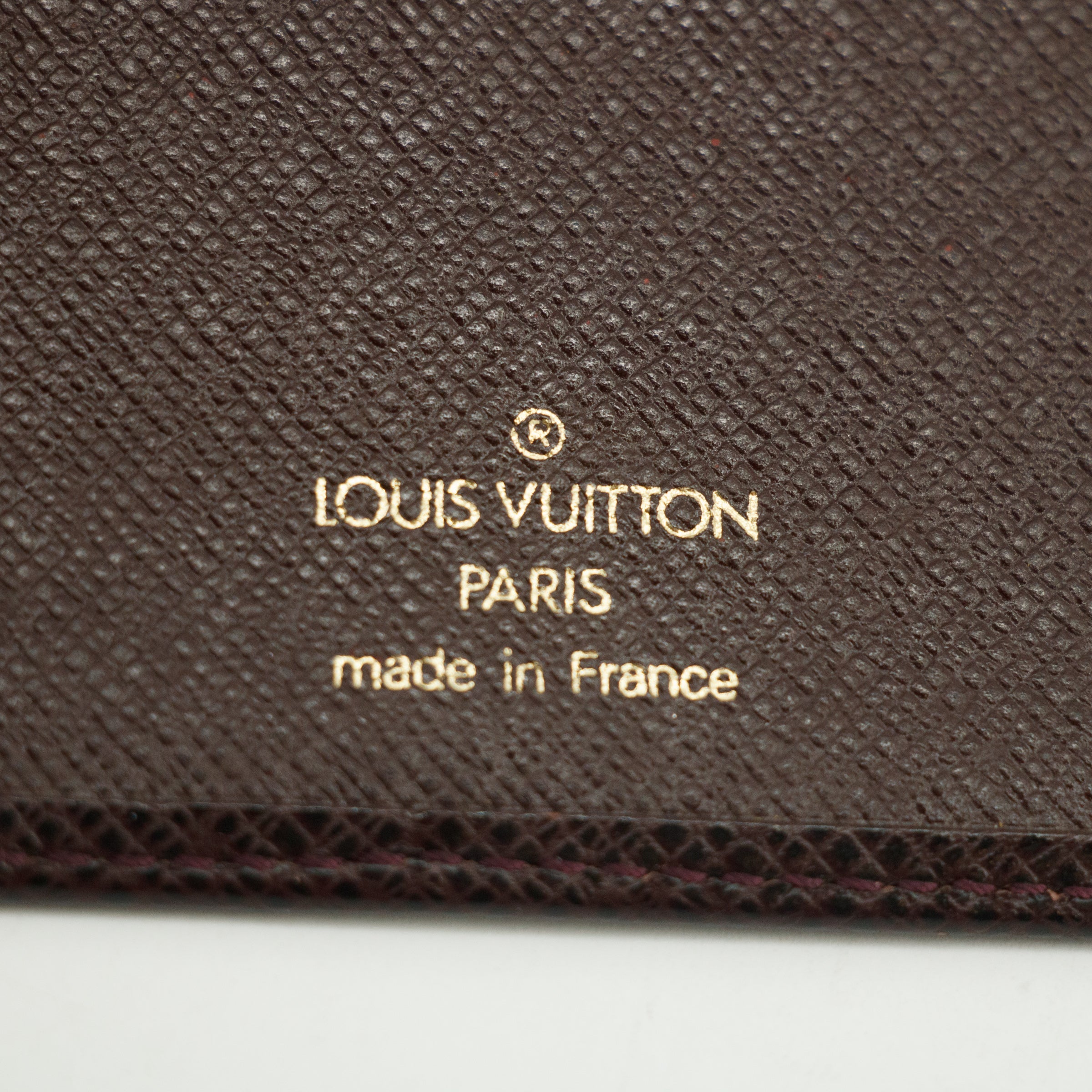 Louis Vuitton Taiga Raisin Bifold Wallet  #3017